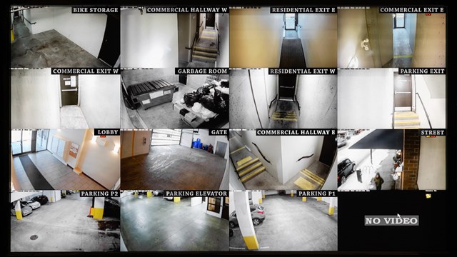 Screen showing security camera views of parking, gate, garbage and recycling room, staircase and hallway.