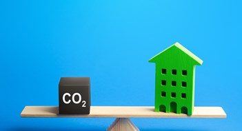 Residential building and CO2 emissions on scales. Greenhouse gas Emissions. Improving energy efficiency, lowering impact on environment. Decarbonization. Climate change. Annual pollution calculation