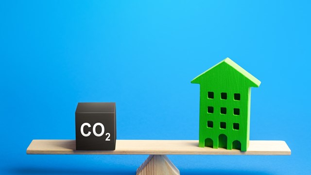 Residential building and CO2 emissions on scales. Greenhouse gas Emissions. Improving energy efficiency, lowering impact on environment. Decarbonization. Climate change. Annual pollution calculation