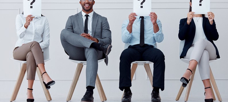 Man at hiring company smile for interview, with manager or boss to join team of workers. Young professional male in group of people, for job recruitment at business or office for growth in career.