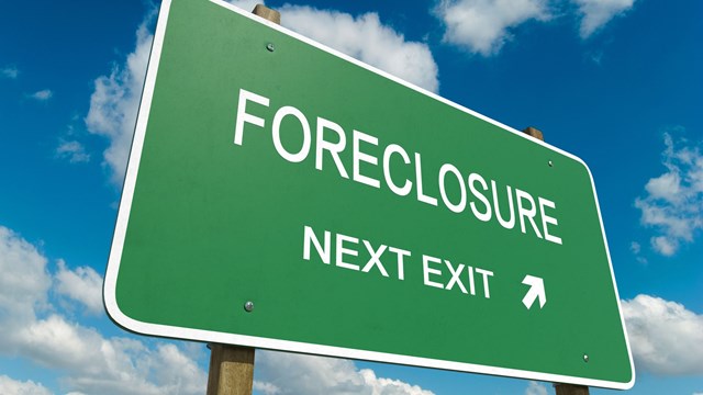 Road sign to foreclosure
