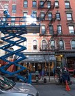 New York City, United States - March 3, 2016: Cinema lights illuminate a film set on a small street near Chinatown
