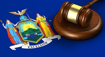 New York US state law, code, legal system and justice concept with a 3d render of a gavel on the New Yorker flag on background.