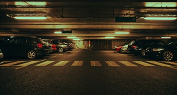 Modern underground parking with cars