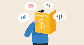 Financial Literacy for Board Members Financial literacy and investment. Handbook of knowledge in money management. Stock market. A young man or businessman reading a financial manual.