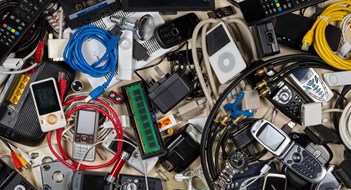 Managing E-Waste Old out of date technology. Electrical items no longer of any use. Obsolete electrical waste for recycling.