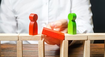 Resolving Disputes with Commercial Tenants & Sponsors A man makes contact between people opponents. Arbitrator and mediator. Build bridges, seek a compromise in disputes and reconciliation of conflicts. Networking in business. Negotiation platform