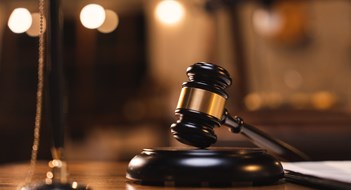 Court Foils Attempt to Block Corporate Transparency Act Judge gavel on the table with blurry books in the background