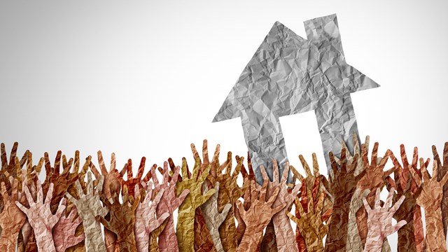 Selling A Home as a group of diverse home buyers reaching for real estate success in a seller market as a symbol for buying a house and affordability challenges to residential ownership.