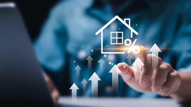 Real estate investment concept. Man touch virtual house icon for analyzing mortgage loan home and insurance real property mortgage. interest rate, Investment planning, business real estate.