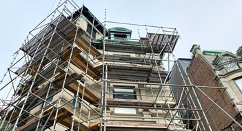 Access Agreements Bill Awaits Hochul's Signature Hoboken, NJ, USA: A meticulous house restoration project featuring a striking brownstone entrance and a stunning building facade renovation.