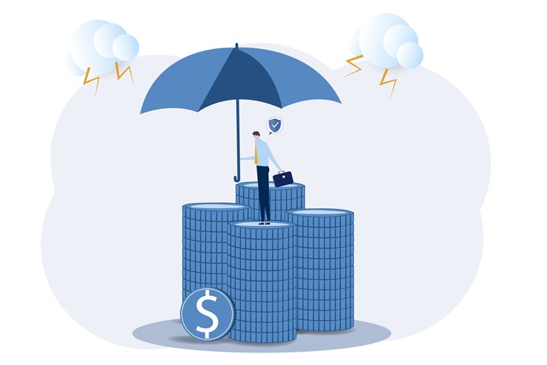 businessman holding strong umbrella to protect money coin,protect financial stability. Increase asset security. Savings, deposits, or retirement funds.