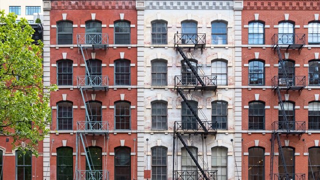 Block of historic buildings along Duane Street in the Tribeca neighborhood of New York City NYC