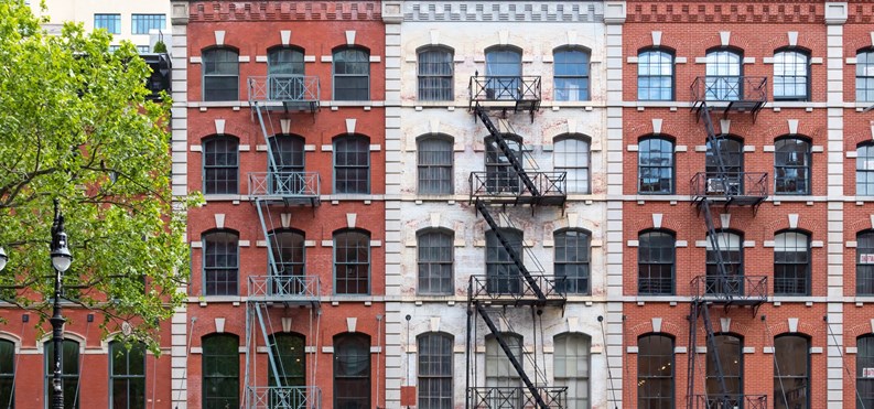 Block of historic buildings along Duane Street in the Tribeca neighborhood of New York City NYC