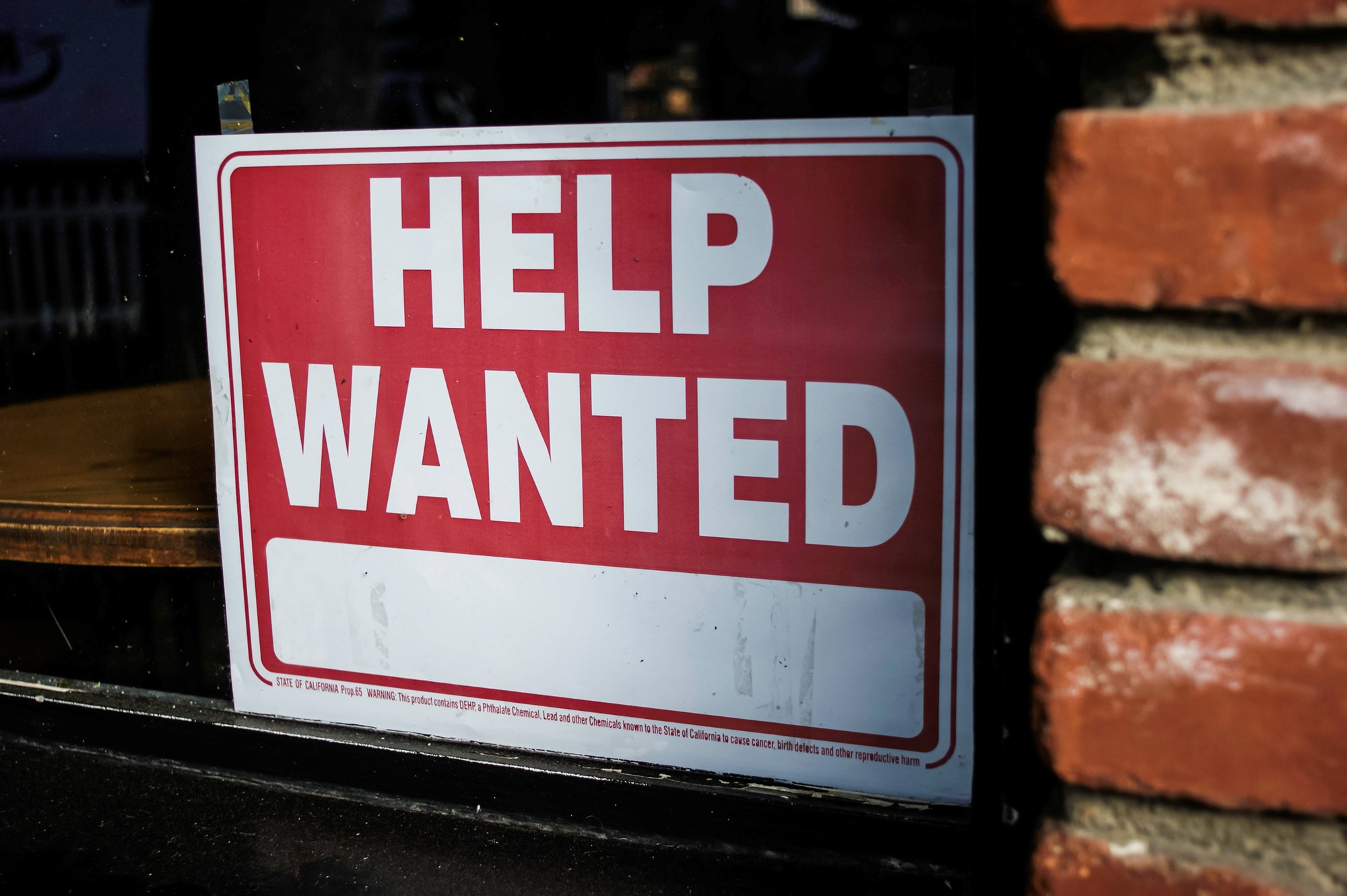 Help wanted sign on business window