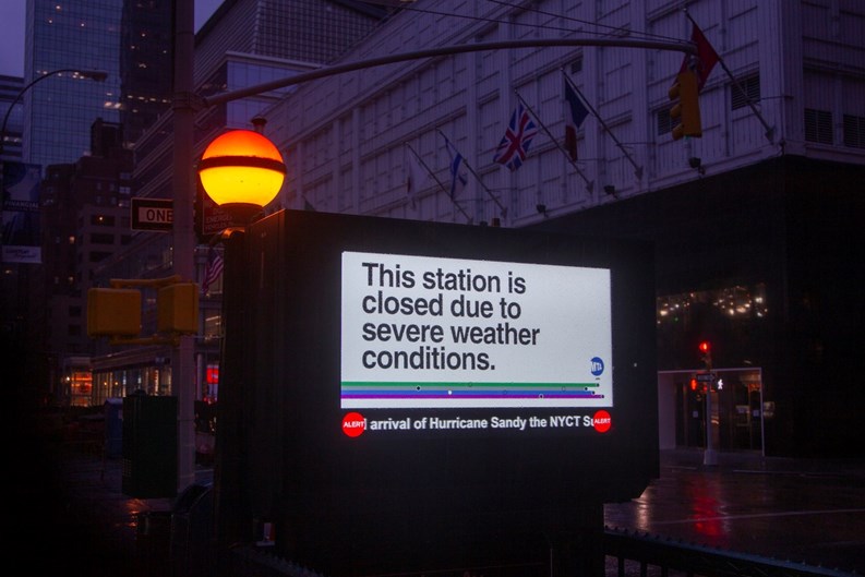 New York, New York - Oct 29 2012: A digital display above the entrance of the subway as Hurricane Sandy moves in the New York City area on Monday, Oct. 29, 2012.
